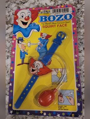 Vintage Bozo Squirt Face Clown Wrist Toy. Original Packaging